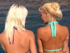 Hot blonde lesbian babes on a boat